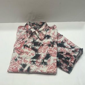 Capsule cool, bohemian tie-dye shirt, frail endings, meant to be that way.